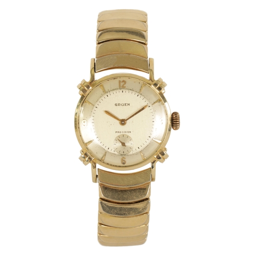 284 - A GENTLEMAN’S 14CT GOLD GRUEN PRECISION WRISTWATCH on a gold plated bracelet, the case with stylish ... 