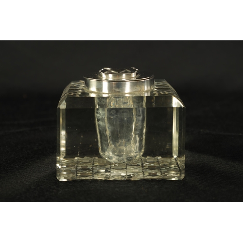 289 - AN EDWARD VII SQUARE HOBNAIL-CUT GLASS SILVER MOUNTED INKWELL the chamfer-edge top set with a silver... 