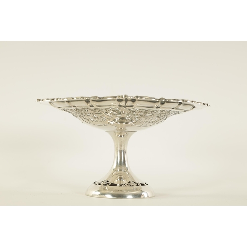 297 - A VICTORIAN SILVER PEDESTAL SWEETMEAT DISH the scalloped scrolled leafwork border enclosing a five s... 