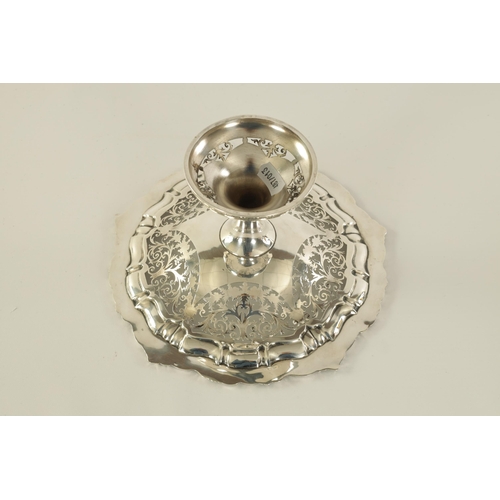 297 - A VICTORIAN SILVER PEDESTAL SWEETMEAT DISH the scalloped scrolled leafwork border enclosing a five s... 