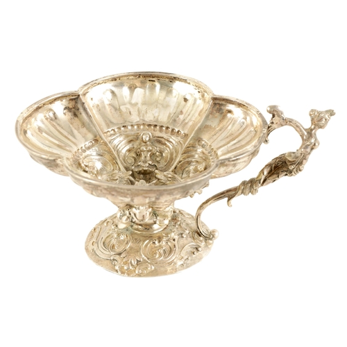 298 - A 19TH CENTURY CONTINENTAL SILVER BASKET cast with figures within joined shells mounted on a rococo ... 