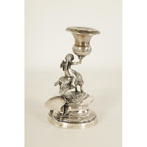 299 - A 19TH CENTURY CONTINENTAL SILVER FIGURAL CANDLESTICK modelled as Cupid riding a goat holding an eng... 