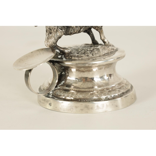 299 - A 19TH CENTURY CONTINENTAL SILVER FIGURAL CANDLESTICK modelled as Cupid riding a goat holding an eng... 