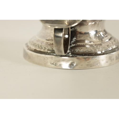 299 - A 19TH CENTURY CONTINENTAL SILVER FIGURAL CANDLESTICK modelled as Cupid riding a goat holding an eng... 