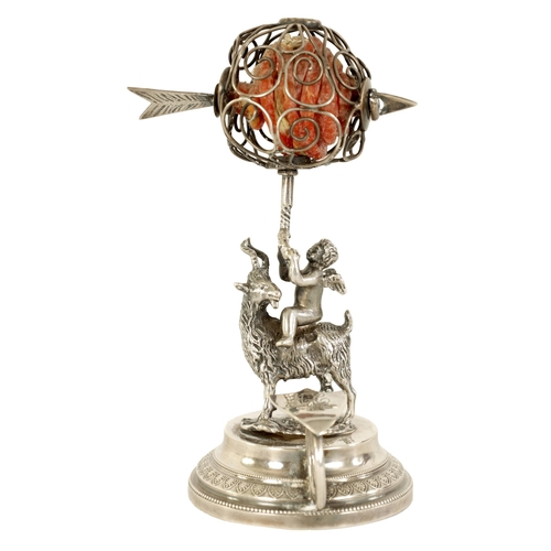 300 - A 19TH CENTURY CONTINENTAL SILVER FIGURAL WAX JACK modelled as Cupid riding a goat beneath a spheric... 