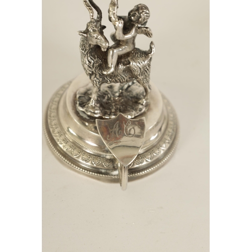 300 - A 19TH CENTURY CONTINENTAL SILVER FIGURAL WAX JACK modelled as Cupid riding a goat beneath a spheric... 