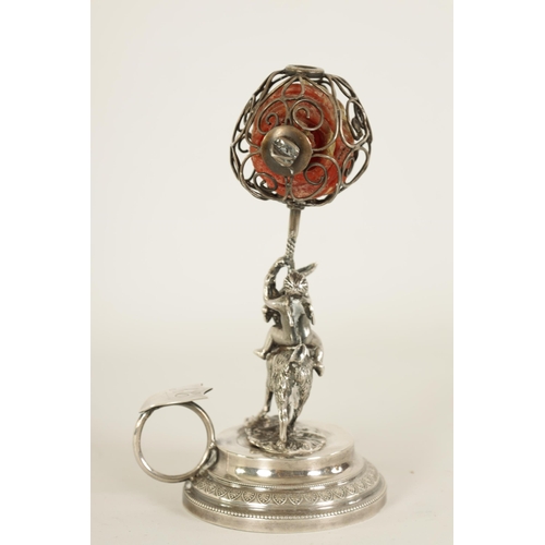 300 - A 19TH CENTURY CONTINENTAL SILVER FIGURAL WAX JACK modelled as Cupid riding a goat beneath a spheric... 