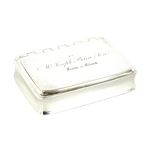 303 - A GEORGE III SCOTTISH SILVER SNUFF BOX of plain rectangular form with hinged inscribed lid and gilt ... 