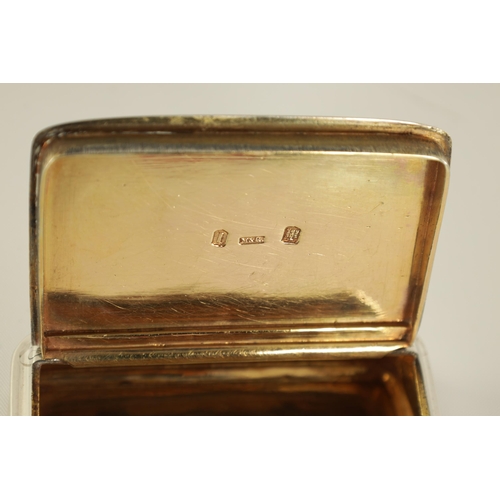 303 - A GEORGE III SCOTTISH SILVER SNUFF BOX of plain rectangular form with hinged inscribed lid and gilt ... 