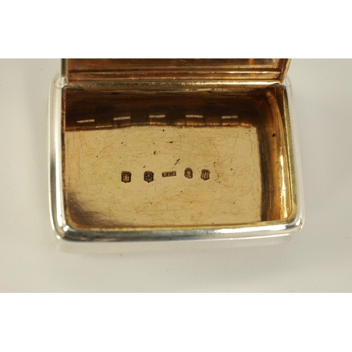 303 - A GEORGE III SCOTTISH SILVER SNUFF BOX of plain rectangular form with hinged inscribed lid and gilt ... 