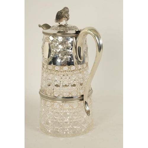 305 - A VICTORIAN SILVER MOUNTED CLARET JUG the tapering hobnail cut glass body and girdled silver neck mo... 