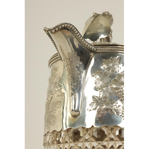 305 - A VICTORIAN SILVER MOUNTED CLARET JUG the tapering hobnail cut glass body and girdled silver neck mo... 