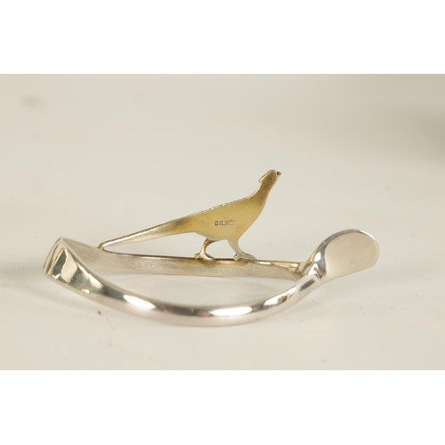 310 - A 20TH CENTURY CASED SET OF 12 SILVER AND SILVER GILT WISH BONE GAME BIRD NAPKIN HOLDERS comprising ... 