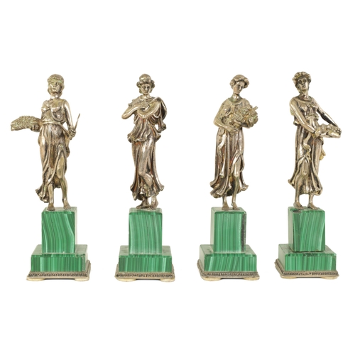 319 - A SET OF FOUR ITALIAN SILVER AND MALACHITE SCULPTURES modelled as the four seasons standing on squar... 