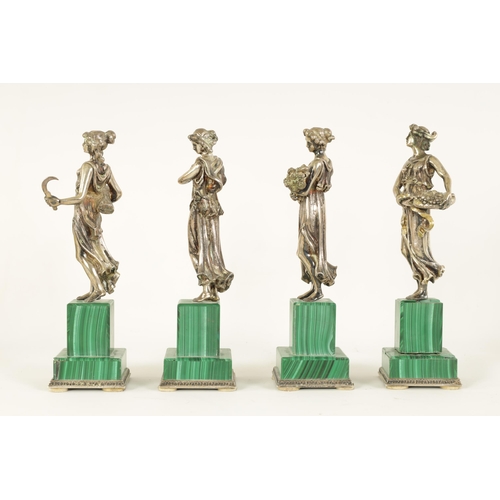 319 - A SET OF FOUR ITALIAN SILVER AND MALACHITE SCULPTURES modelled as the four seasons standing on squar... 