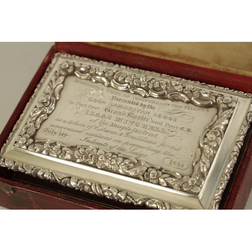 324 - A FINE EARLY VICTORIAN SILVER PRESENTATION SNUFF BOX of rectangular form with shaped and raised flow... 