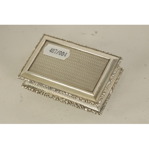 324 - A FINE EARLY VICTORIAN SILVER PRESENTATION SNUFF BOX of rectangular form with shaped and raised flow... 