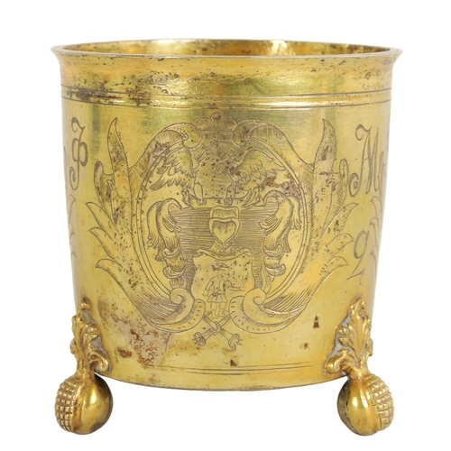 325 - A LATE 17TH CENTURY GERMAN SILVER GILT CYLINDRICAL BEAKER BEARING ENGRAVED FAMILY CRESTS AND INITIAL... 