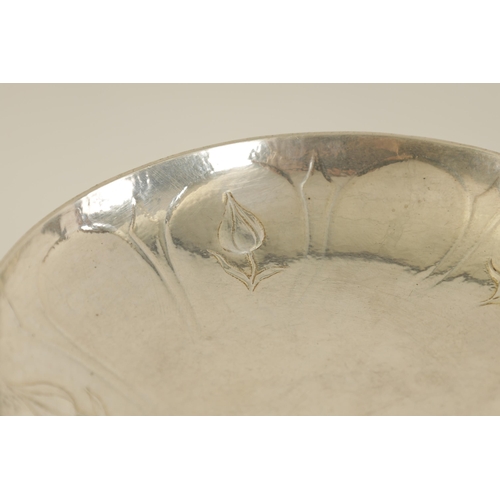 330 - GILBERT MARKS. A NEAR PAIR OF ART AND CRAFTS SILVER TAZZE of circular form with embossed and planish... 