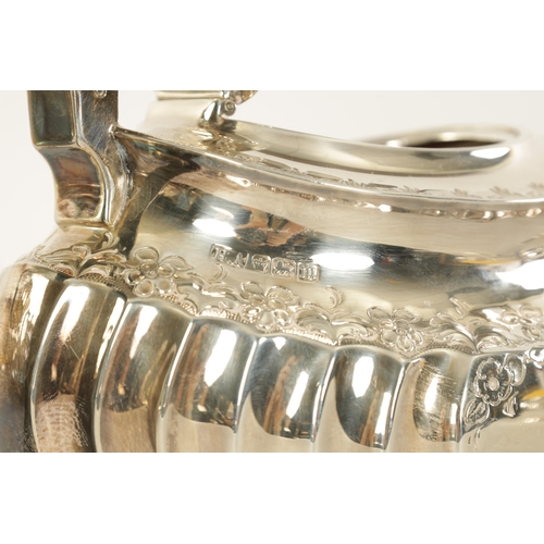 331 - AN EDWARD VII FIVE PIECE SILVER TEA SERVICE TOGETHER WITH A SILVER PLATED SALVER of oblate swirl-flu... 