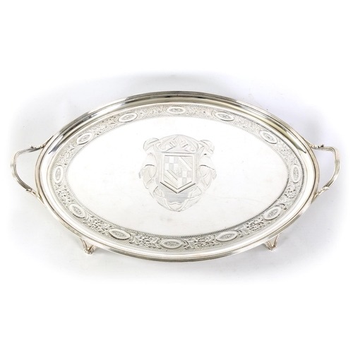 337 - A FINE GEORGE III OVAL SILVER TWO-HANDLED TRAY the ribbed border with beaded inner edging enclosing ... 