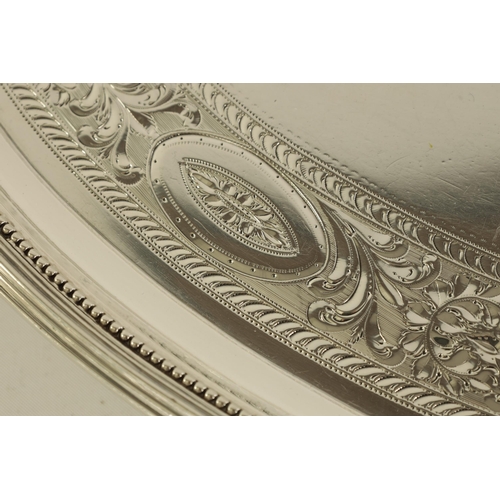 337 - A FINE GEORGE III OVAL SILVER TWO-HANDLED TRAY the ribbed border with beaded inner edging enclosing ... 