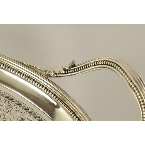 337 - A FINE GEORGE III OVAL SILVER TWO-HANDLED TRAY the ribbed border with beaded inner edging enclosing ... 