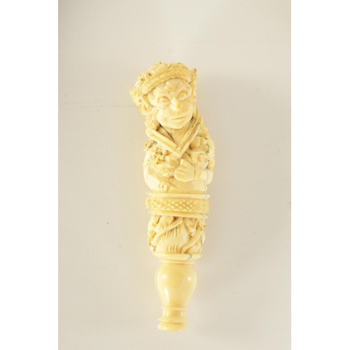 342 - FOUR 19TH CENTURY CARVED IVORY STICK HANDLES together with an ivory and amber cheroot holder.