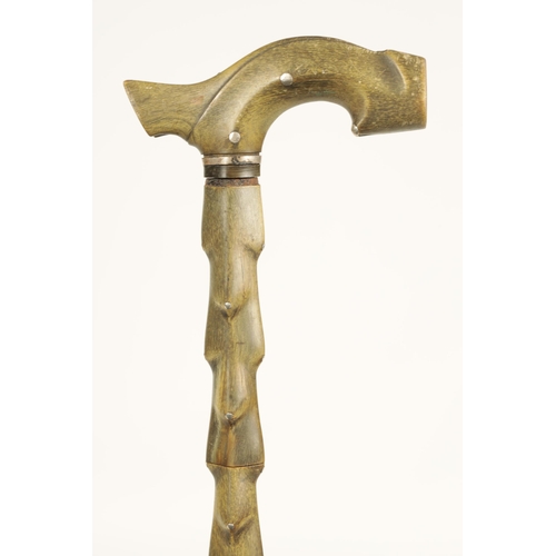 349 - A 19TH CENTURY SEGMENTED HORN WALKING STICK with silver studded decoration (89cm overall )