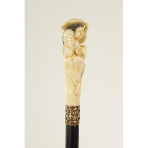 350 - A JAPANESE MEIJI PERIOD CARVED IVORY LADIES WALKING STICK depicting a seated figure with hat - signe... 