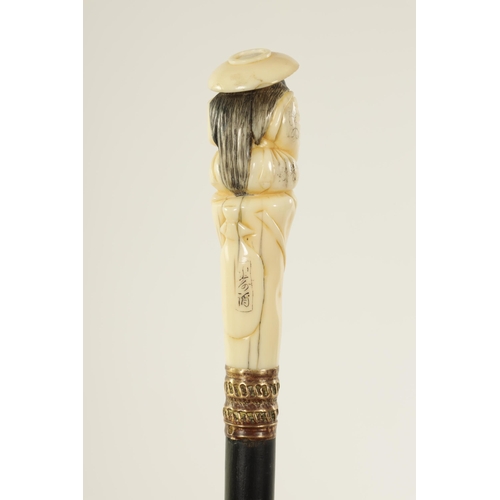 350 - A JAPANESE MEIJI PERIOD CARVED IVORY LADIES WALKING STICK depicting a seated figure with hat - signe... 