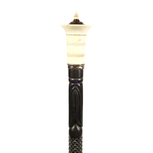 354 - AN UNUSUAL LATE 19TH CENTURY EBONY AND IVORY ANGLO-INDIAN WALKING STICK WITH PULL-OUT WHISTLE the tu... 