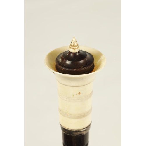 354 - AN UNUSUAL LATE 19TH CENTURY EBONY AND IVORY ANGLO-INDIAN WALKING STICK WITH PULL-OUT WHISTLE the tu... 