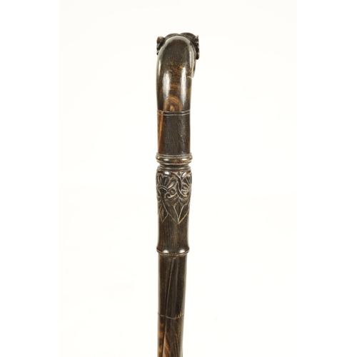 355 - A 19TH CENTURY ANGLO INDIAN SEGMENTED HORN WALKING STICK possibly rhinoceros horn, of twisted design... 