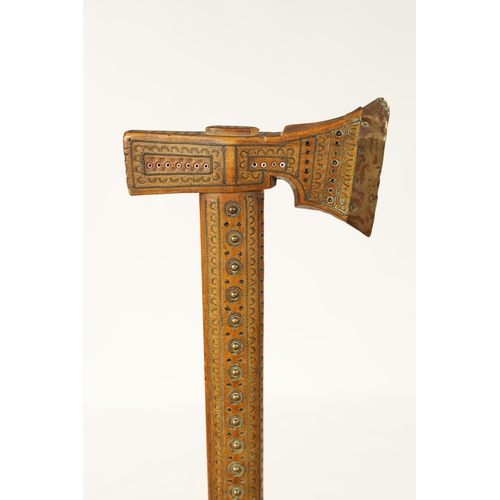 357 - A 19TH CENTURY EASTERN AXE HEAD HANDLED WALKING STICK decorated with domed brass stud work, brass an... 