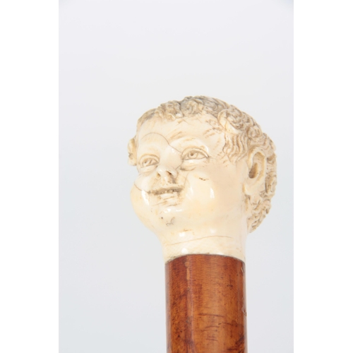 358 - A 19TH CENTURY MALACCA WALKING STICK BY JONATHAN HOWELL with finely carved ivory Roman-style head ha... 