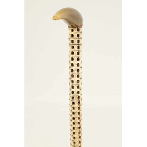 360 - A 19TH CENTURY SHARK VERTEBRAE WALKING STICK WITH RHINOCEROS HORN HANDLE (91cm overall)