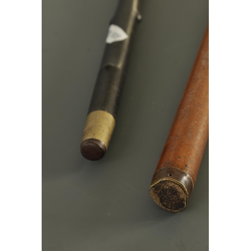 365 - TWO LATE 19TH CENTURY IVORY HANDLED WALKING STICKS one with silver embossed collar dated 1887 on a m... 