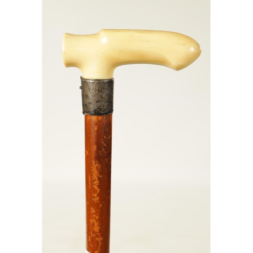 366 - A 19TH CENTURY EROTIC CARVED IVORY HANDLED WALKING STICK with carved ivory phallic handle on an engr... 