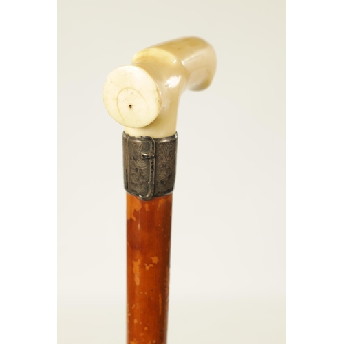 366 - A 19TH CENTURY EROTIC CARVED IVORY HANDLED WALKING STICK with carved ivory phallic handle on an engr... 