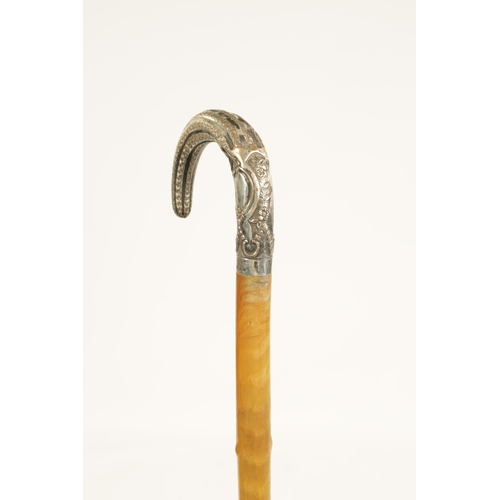 373 - A LATE 19TH CENTURY RHINOCEROS HORN SILVERED METAL MOUNTED WALKING STICK with branch effect tapering... 