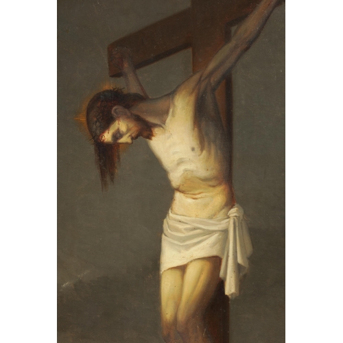 398 - 19TH CENTURY CONTINENTAL OIL ON CANVAS depicting Christ on the cross - indistinctly signed, mounted ... 