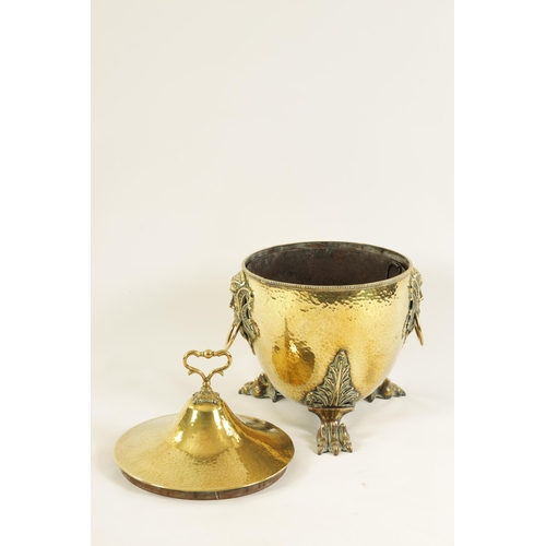 448 - A 19TH CENTURY ADAM STYLE URN SHAPED BRASS COAL BUCKET with shaped leaf cast handle above a pair of ... 