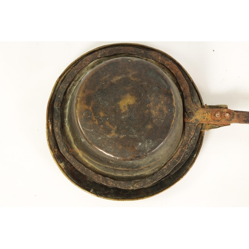 450 - A CHARLES II BRASS AND IRONWORK WARMING PAN DATED 164? engraved with Arms of Lichfield to the lid; w... 