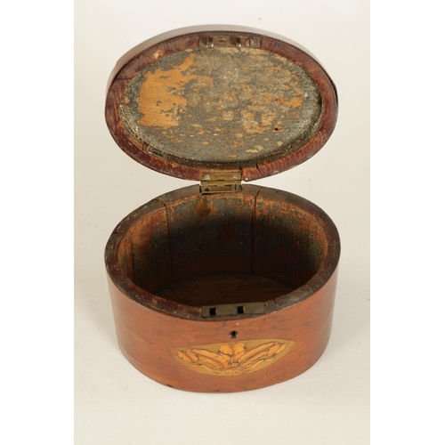 458 - A GEORGE III OVAL INLAID MAHOGANY TEA CADDY with urn-shaped inlaid top and prince of wales feathers ... 