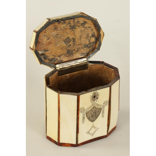 469 - A SMALL GEORGIAN DECAGONAL IVORY, TORTOISESHELL AND MOTHER OF PEARL INLAID TEA CADDY with silver met... 