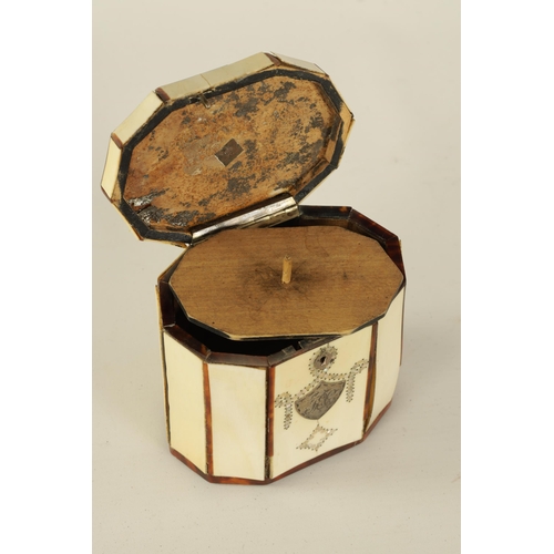 469 - A SMALL GEORGIAN DECAGONAL IVORY, TORTOISESHELL AND MOTHER OF PEARL INLAID TEA CADDY with silver met... 