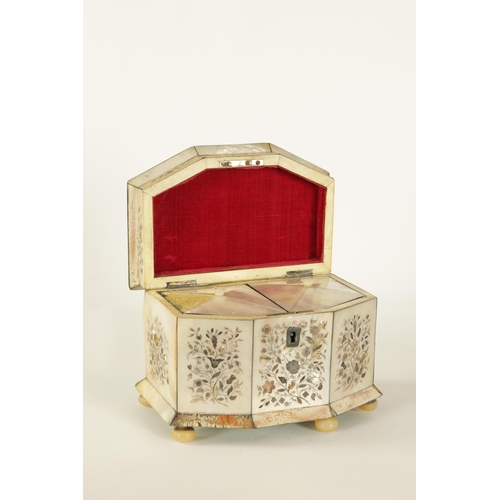 472 - A 19TH CENTURY INLAID MOTHER OF PEARL TEA CADDY of canted angled form decorated with fine contrastin... 