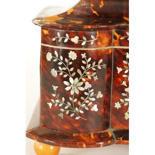 473 - A 19TH CENTURY INVERTED DOUBLE BOW-SIDED TORTOISESHELL AND MOTHER-OF-PEARL INLAID TEA CADDY the pago... 