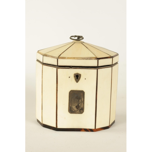 475 - A GEORGIAN PANELLED IVORY AND TORTOISESHELL DECAGONAL ‘TENT TOP’ TEA CADDY with silver axe-drop hand... 